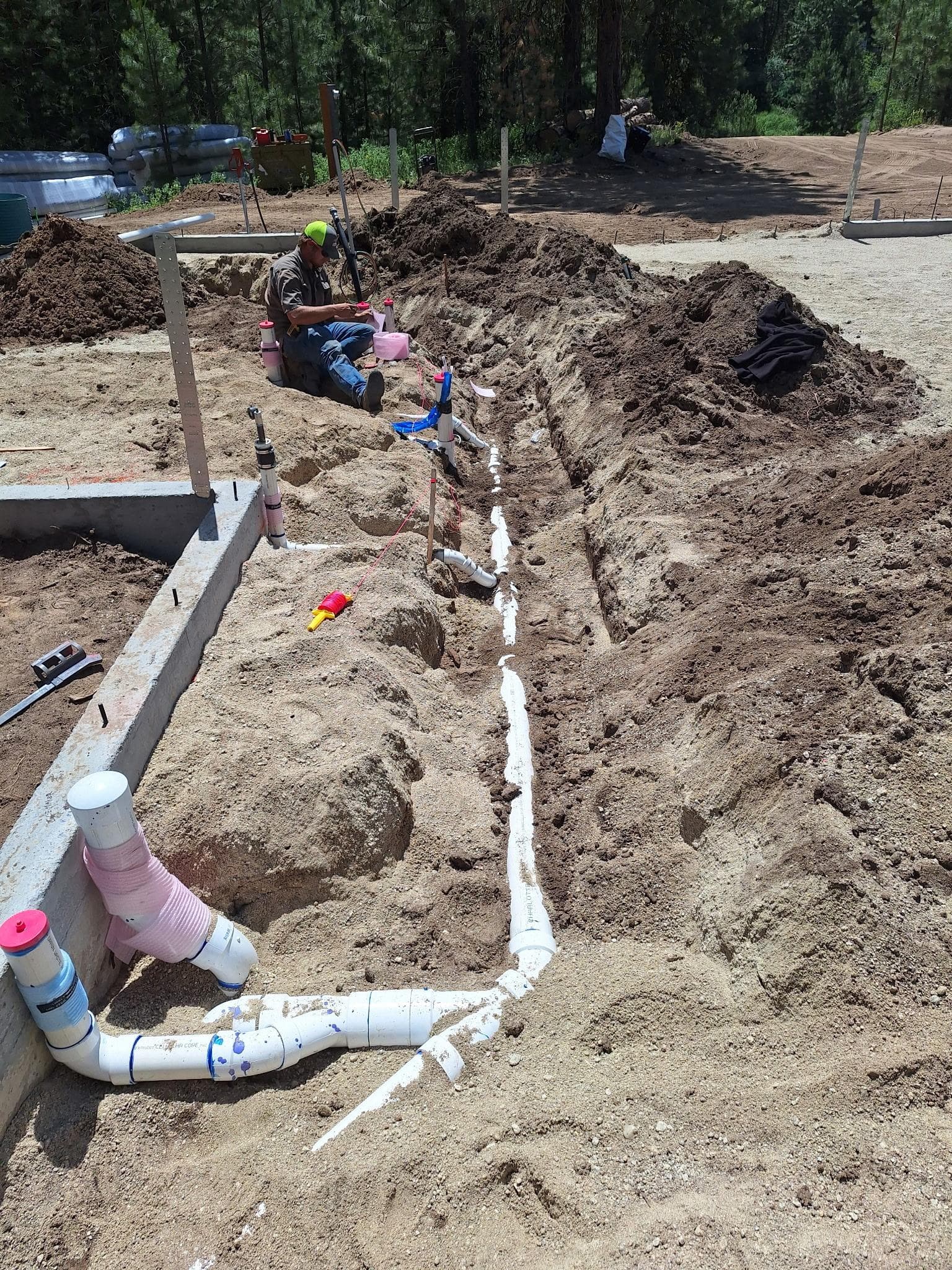 Underground drain or sewer piping exposed during repair work.